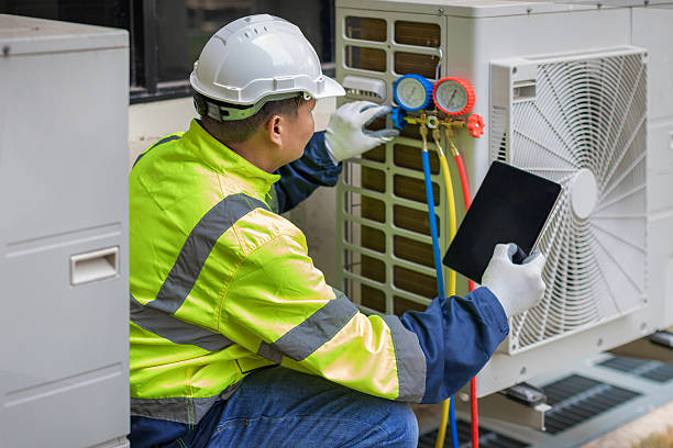 Professional Heat Pump Repair technician working in Southside, AL